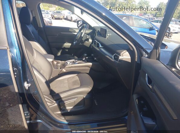 JM3KFBBM1P0256099 2023 MAZDA CX-5 Dark Blue Vista interior delantera