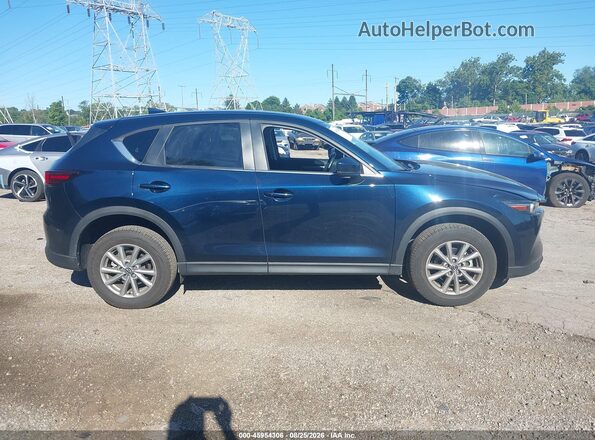 JM3KFBBM1P0256099 2023 MAZDA CX-5 Dark Blue Vista interior trasera