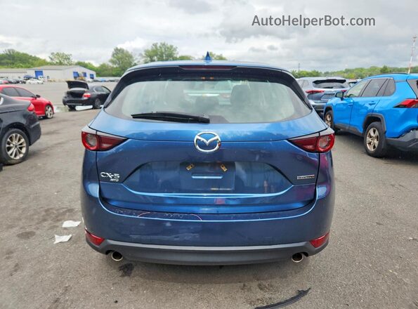 JM3KFBBM8M0333899 2021 MAZDA CX-5 Blue Vista trasera