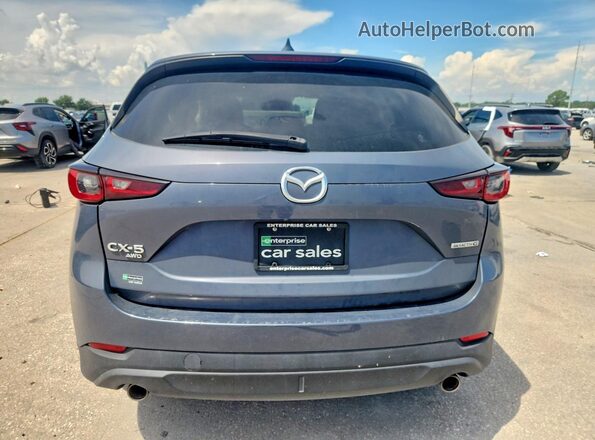 JM3KFBCL4R0530792 2024 MAZDA CX-5 Blue Widok z tyłu