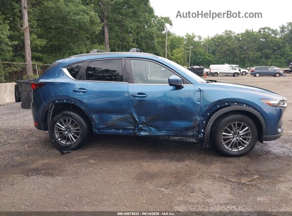 JM3KFBCL6H0203776 2017 MAZDA CX-5 Blue Rear interior view
