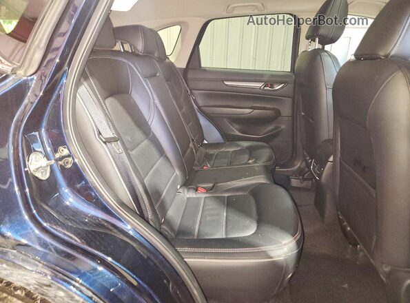 JM3KFBCL8S0673234 2025 MAZDA CX-5 Blue Rear interior view