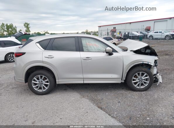 JM3KFBCLXS0543052 2025 MAZDA CX-5 Tan Vista interior trasera
