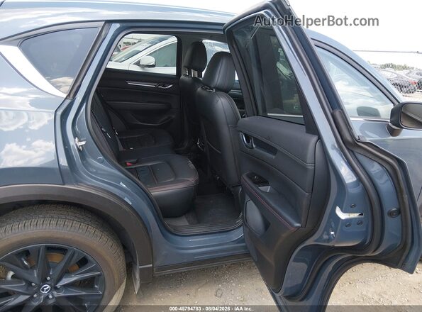 JM3KFBCM0S0681112 2025 MAZDA CX-5 Blue Widok naklejki z numerem VIN