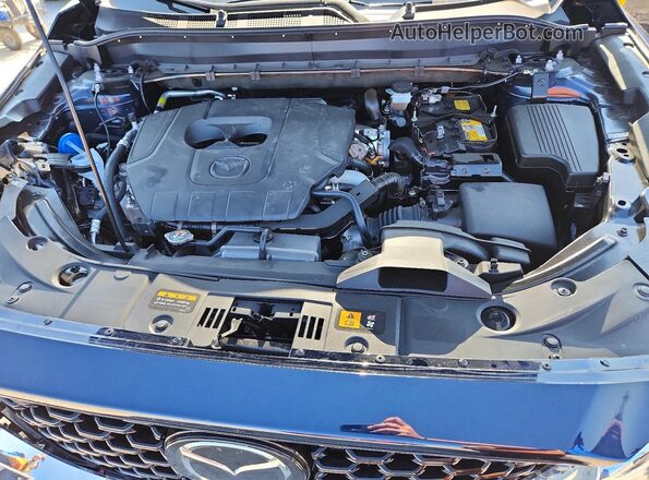 JM3KFBCM1S0693947 2025 MAZDA CX-5 Blue Vista del compartimento del motor
