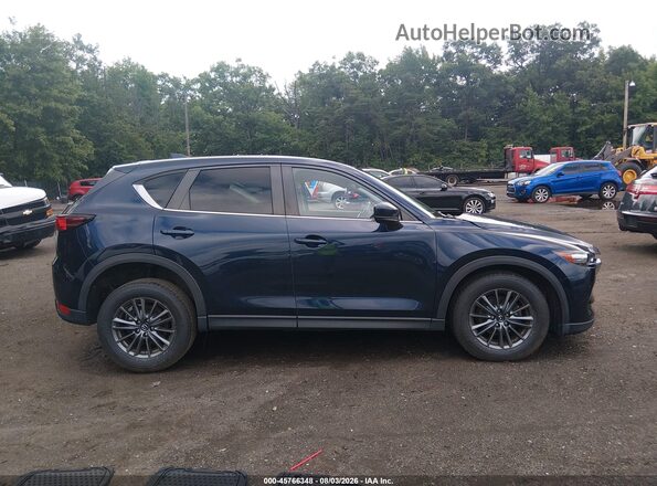 JM3KFBCM2K1589672 2019 MAZDA CX-5 Blue Vista interior trasera