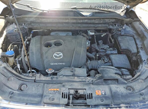 JM3KFBCM2N0568282 2022 MAZDA CX-5 Charcoal Vista interior trasera