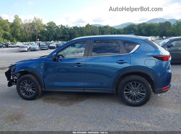 JM3KFBCM3L0838990 2020 MAZDA CX-5 Blue Widok wnętrza z tyłu