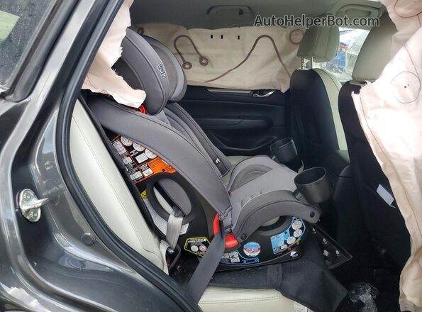 JM3KFBCM7M0418781 2021 MAZDA CX-5 Gray Widok wnętrza z tyłu