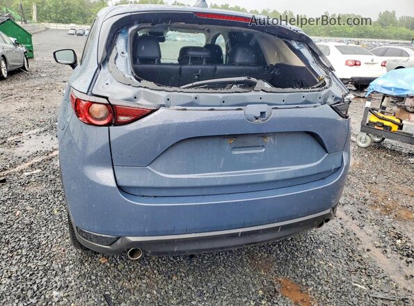 JM3KFBCM7M0433247 2021 MAZDA CX-5 Blue Vista trasera