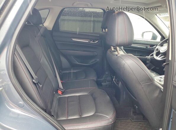 JM3KFBCM7M0433247 2021 MAZDA CX-5 Blue Vista interior trasera