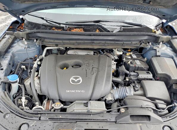 JM3KFBCM7M0433247 2021 MAZDA CX-5 Blue Vista del compartimento del motor