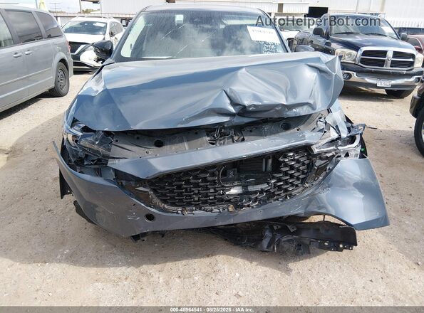 JM3KFBCM7S0690910 2025 MAZDA CX-5 Серый Вид задней части салона