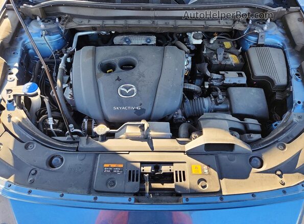 JM3KFBCM8M0500504 2021 MAZDA CX-5 Blue Widok komory silnika