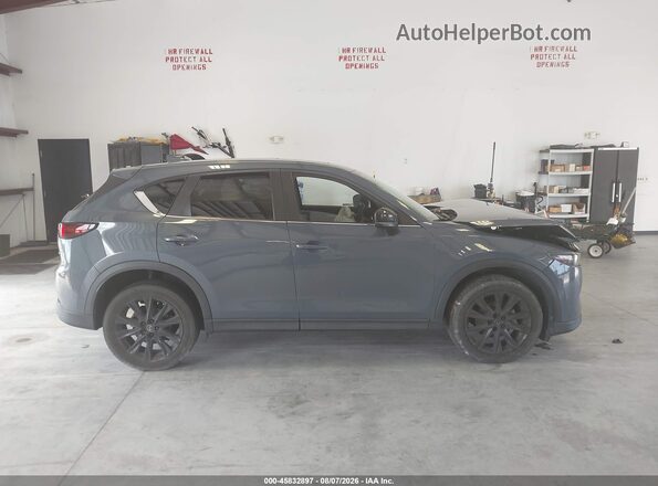 JM3KFBCM9P0186513 2023 MAZDA CX-5 Blue უკანა სალონის ხედი