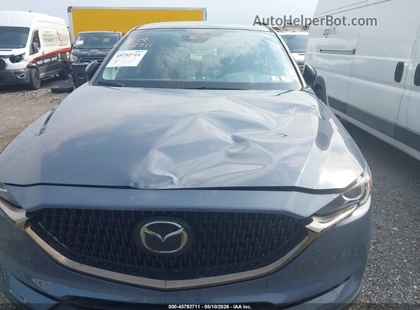 JM3KFBCY8M0493203 2021 MAZDA CX-5 Light Blue Вид спереди