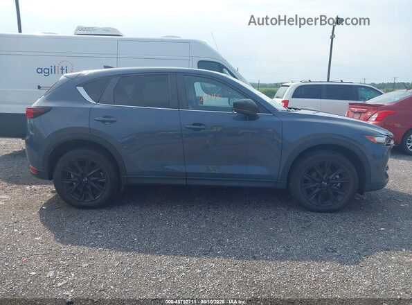 JM3KFBCY8M0493203 2021 MAZDA CX-5 Light Blue Вид задней части салона