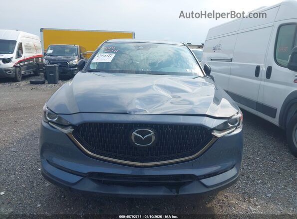 JM3KFBCY8M0493203 2021 MAZDA CX-5 Light Blue Вид щитка приборов