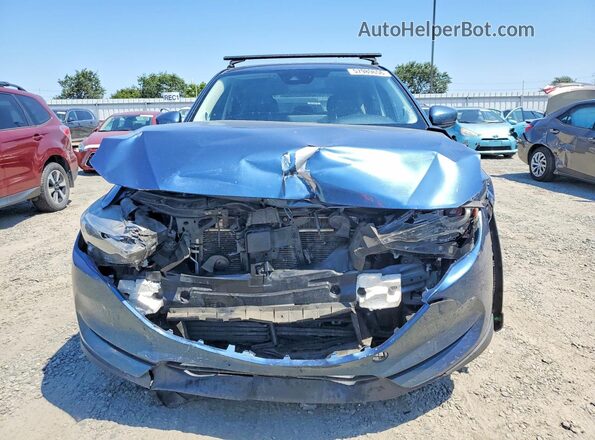 JM3KFBDM0M1384742 2021 MAZDA CX-5 Синий Вид спереди