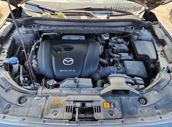 JM3KFBDM2M0427029 2021 MAZDA CX-5 Gray Vista del compartimento del motor