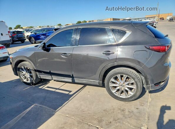 JM3KFBDM4M1346592 2021 MAZDA CX-5 Charcoal Trasero izquierdo