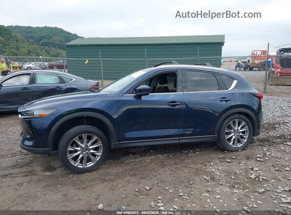 JM3KFBDM5M1409859 2021 MAZDA CX-5 Blue 360 interior view