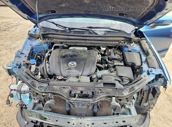 JM3KFBDM5N1568124 2022 MAZDA CX-5 Blue Engine compartment view