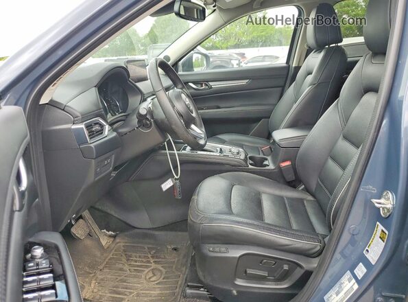 JM3KFBDM6S0558610 2025 MAZDA CX-5 Teal Widok wnętrza z przodu