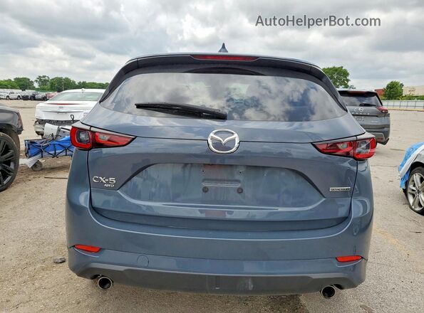JM3KFBDM6S0558610 2025 MAZDA CX-5 Teal Widok z tyłu