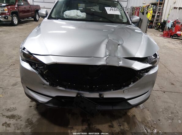 JM3KFBDM7M0484360 2021 MAZDA CX-5 Silver Widok wnętrza z tyłu