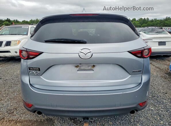JM3KFBDM9M1307660 2021 MAZDA CX-5 Silver Vista trasera
