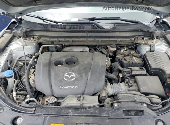 JM3KFBDM9M1307660 2021 MAZDA CX-5 Silver Vista del compartimento del motor