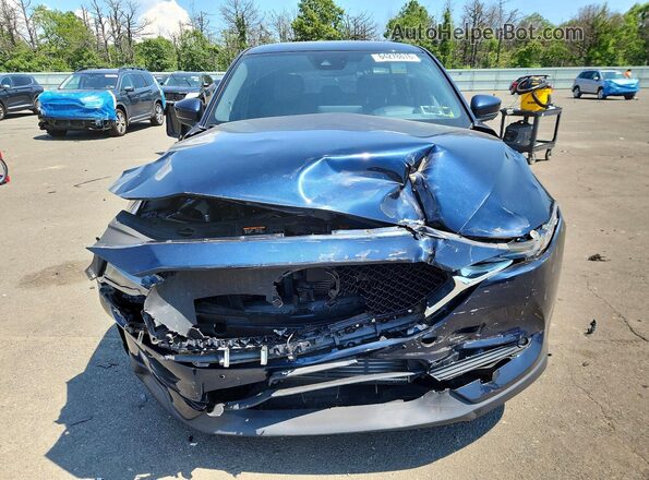 JM3KFBEY2M0428831 2021 MAZDA CX-5 Синий Вид спереди