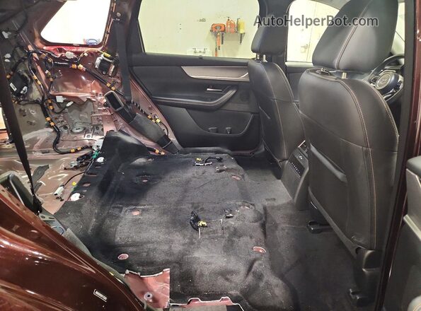 JM3KKDHDXR1133347 2024 MAZDA CX-90 Burgundy Widok wnętrza z tyłu