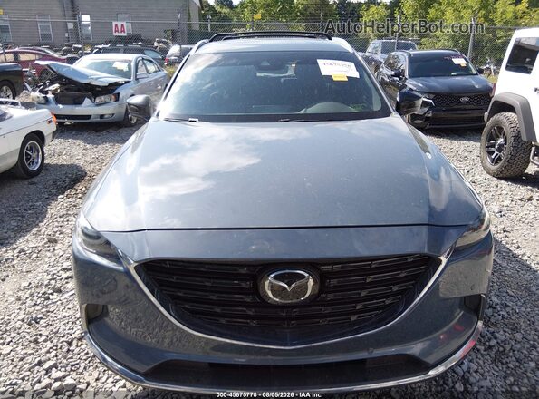 JM3TCBDY2N0600212 2022 MAZDA CX-9 Blue Rear interior view