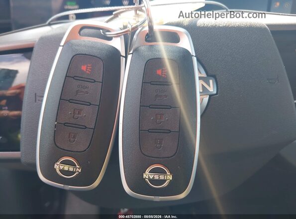 JN1AZ2EB0TM300234 2026 NISSAN LEAF Maroon Vista del salpicadero