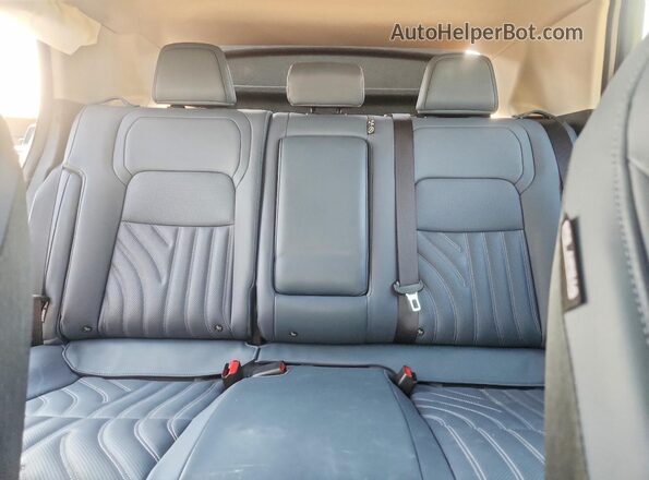 JN1DF0CD5RM734446 2024 NISSAN ARIYA White უკანა სავარძლების ხედი