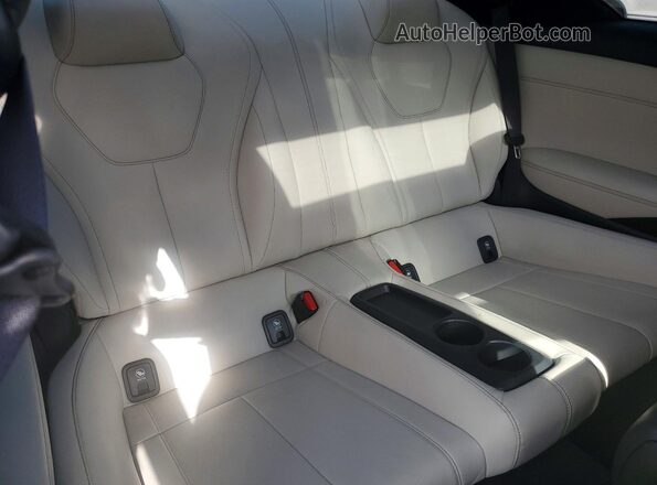 JN1EV7EL2HM554053 2017 INFINITI Q60 Gray Հետևի նստատեղերի տեսք