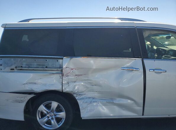 JN8AE2KPXG9152891 2016 NISSAN QUEST White Widok wnętrza z tyłu