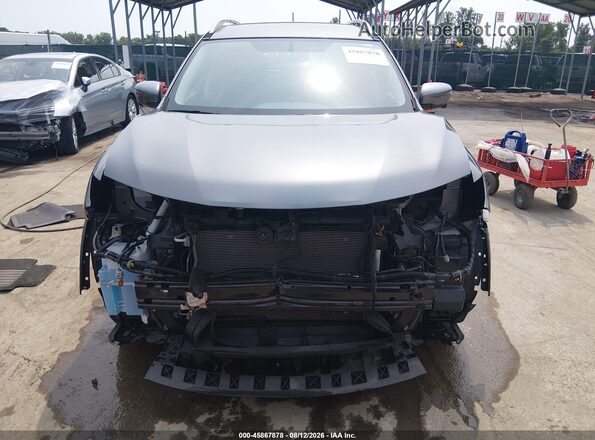 JN8AT2MT5GW010305 2016 NISSAN ROGUE Black Rear interior view