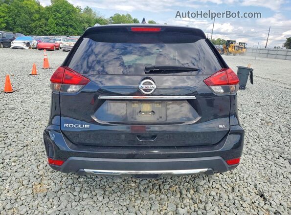 JN8AT2MT7JW464692 2018 NISSAN ROGUE Black Rear view