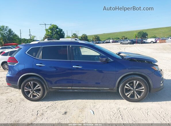 JN8AT2MV1JW306950 2018 NISSAN ROGUE Blue Vista interior trasera