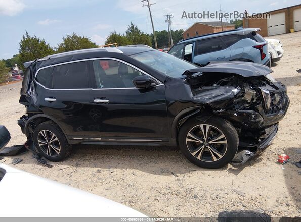 JN8AT2MV6JW316258 2018 NISSAN ROGUE Black Vista interior trasera