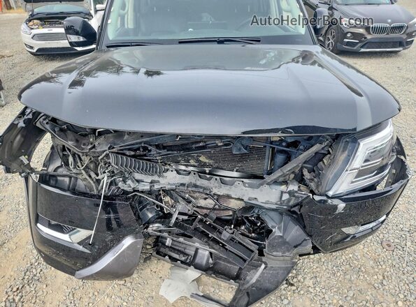 JN8AY2AC8P9180792 2023 NISSAN ARMADA Black Vista del compartimento del motor