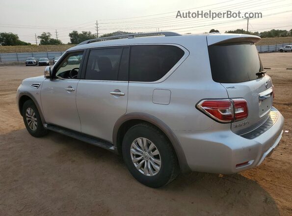 JN8AY2NCXH9504479 2017 NISSAN ARMADA Silver Trasero izquierdo