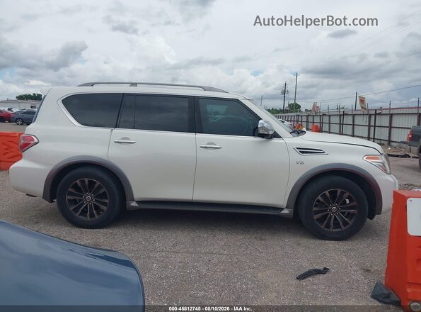 JN8AY2NF1H9301801 2017 NISSAN ARMADA White Rear interior view