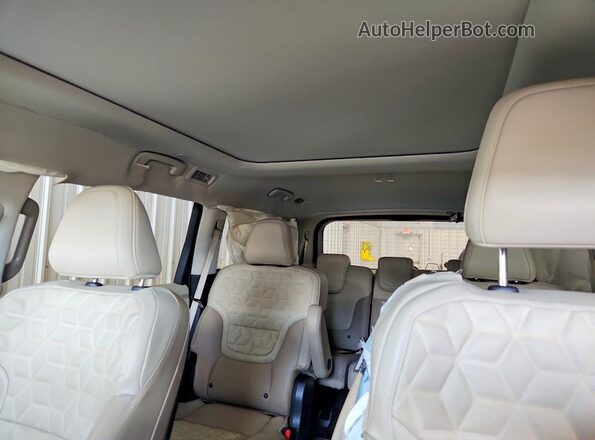 JN8AY3CF0S9500337 2025 NISSAN ARMADA Burgundy Vista de los asientos traseros