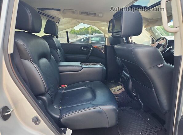 JN8AZ2NF5G9611607 2016 INFINITI QX80 Silver Rear interior view