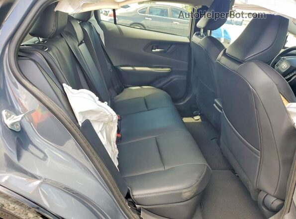 JTDACAAU4R3035669 2024 TOYOTA PRIUS Gray Rear interior view
