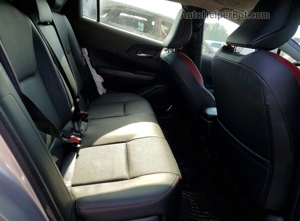 JTDACACU1S3043473 2025 TOYOTA PRIUS Silver Vista de los asientos traseros